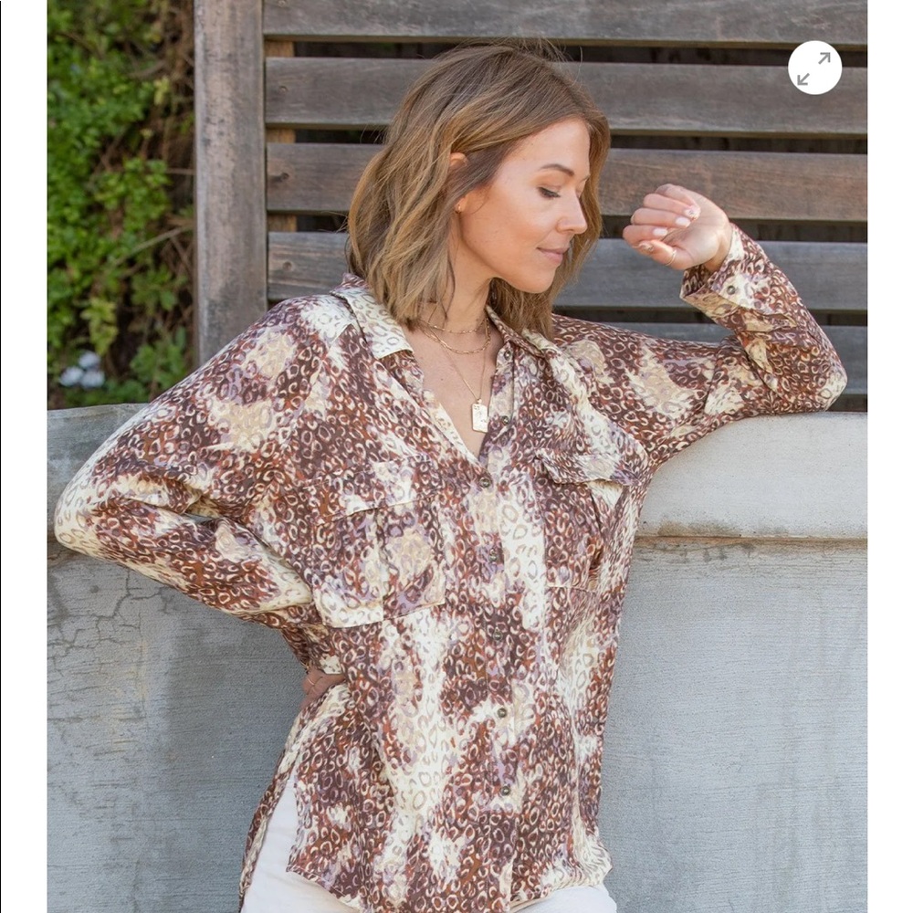 Lovestitch 2 brand new with tags new button down blouses. $23 2 shirts included